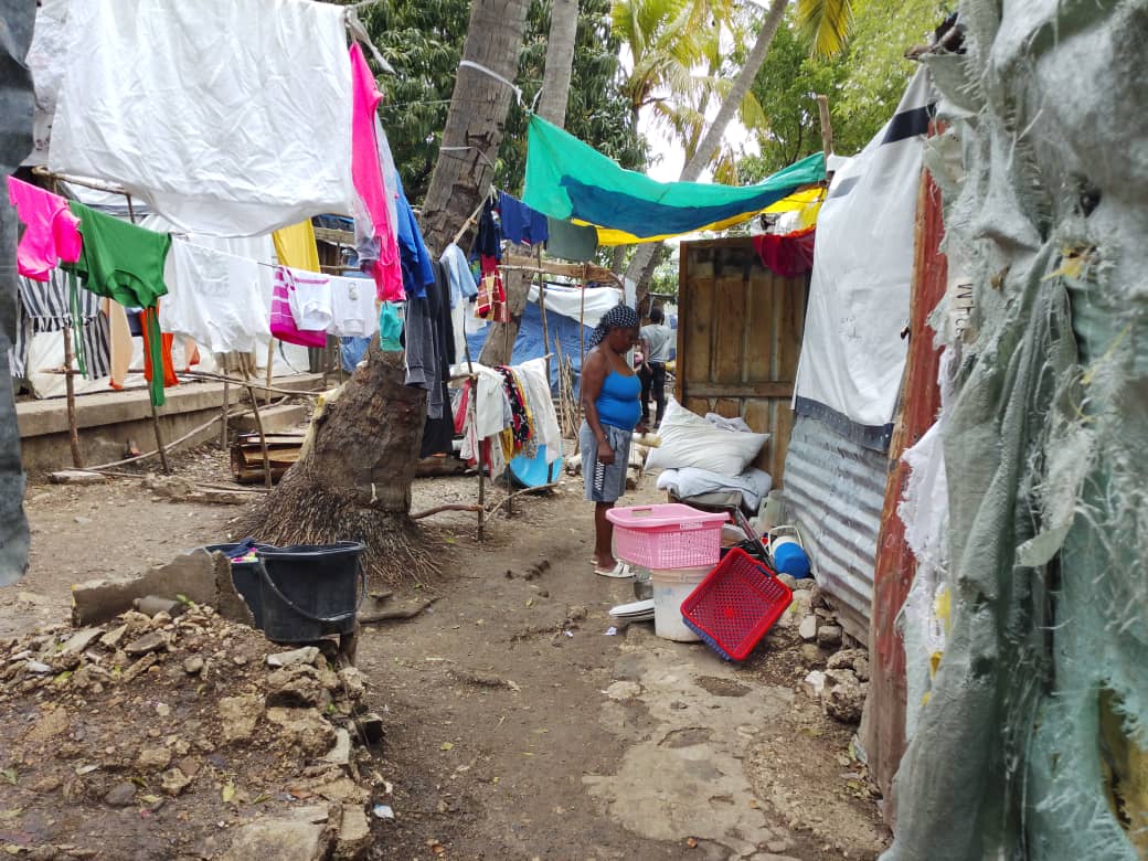 Haitian mother in a displacement community